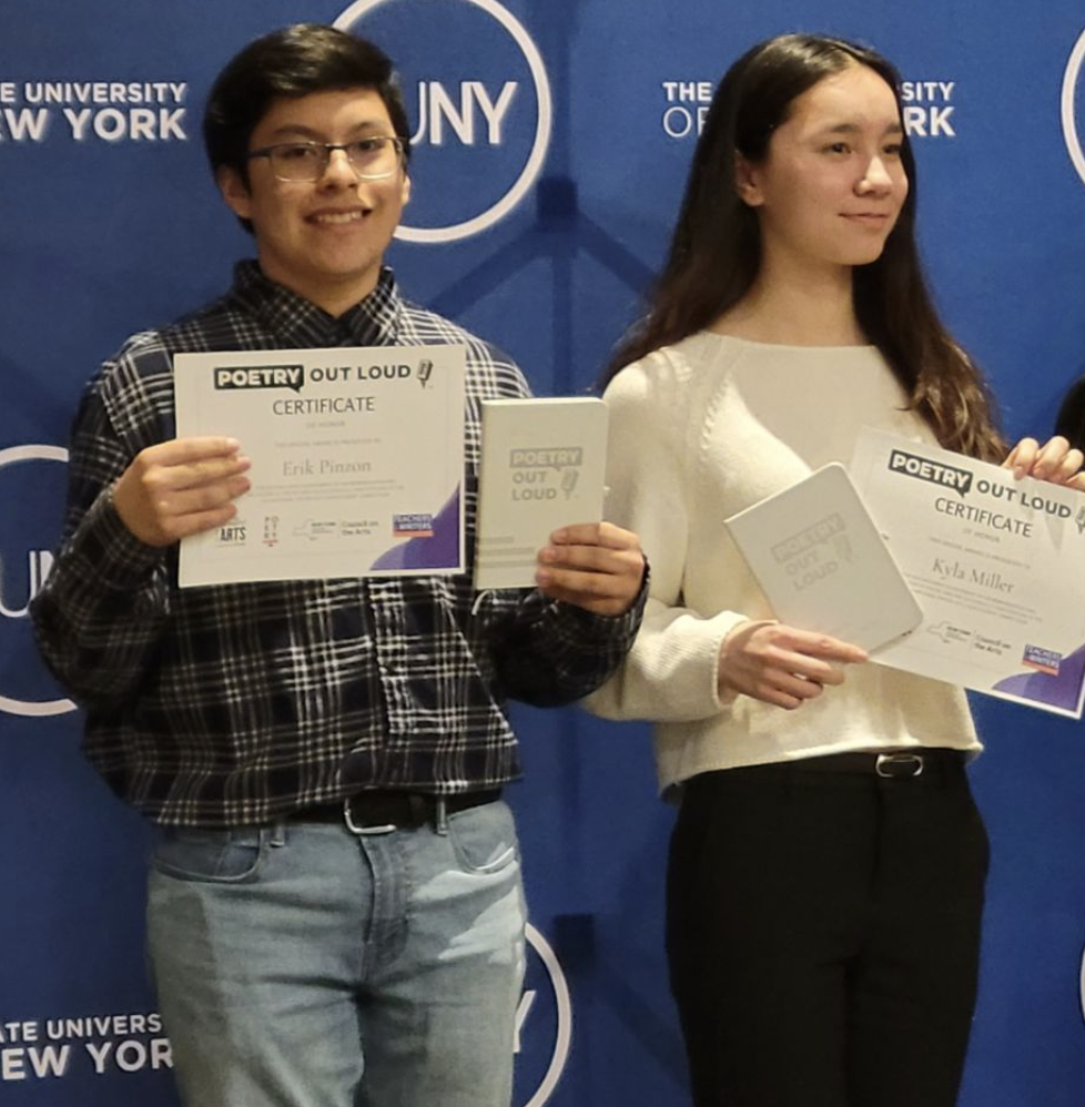 Erik Pinzon (left) and Kyla Miller (right) proudly display their awards. Photo by Lindsay Shields.